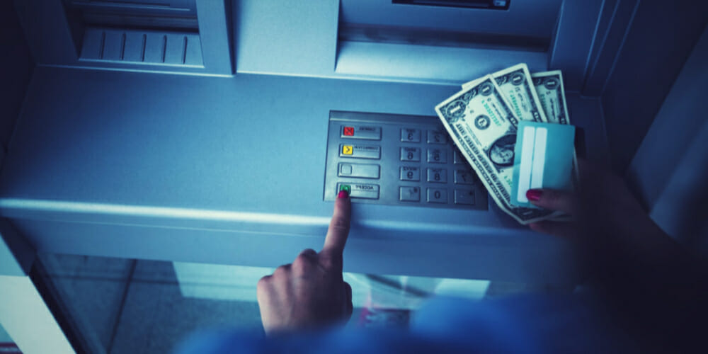 how to withdraw money from bank other than my own