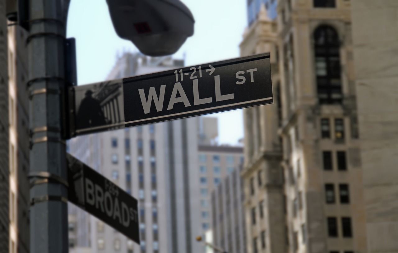 An image of the street sign for Wall Street