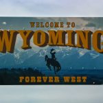 A welcome sign to the state of Wyoming, where the first state-issued stablecoin will make its debut.