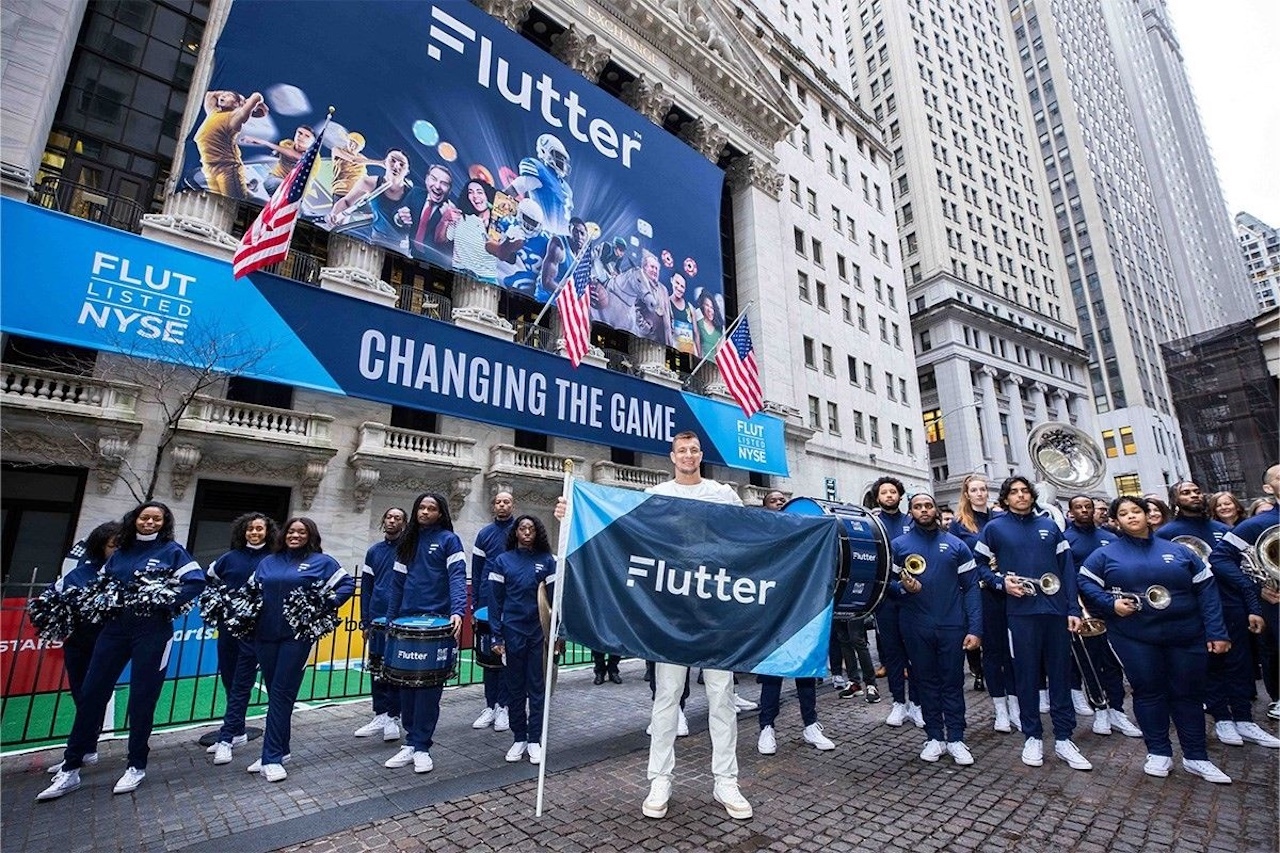 A photo of former NFLer Rob Gronkowski celebrating Flutter getting listed on the NYSE.