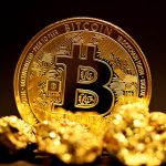 A photo of Bitcoin and gold nuggets.